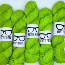 Load image into Gallery viewer, Five skeins of bright green yarn with &#39;Feisty Fibres&#39; labels on a white background
